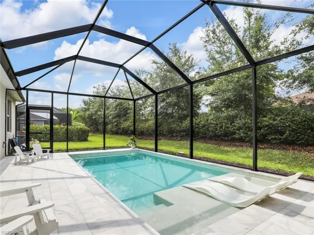 Sunshelf and sitting ledge in newly built (2023) custom Pool