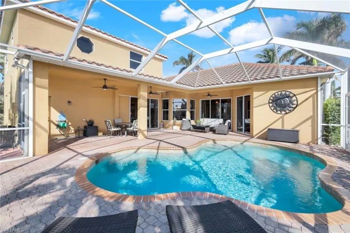 Custom pool, spacious screened Lanai.