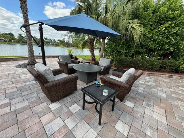 View of patio / terrace with a water view