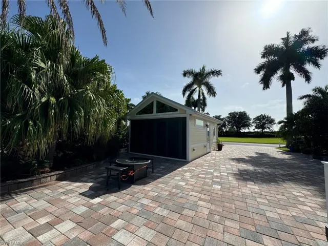 View of patio / terrace featuring a garage