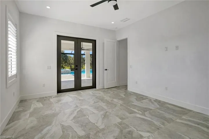 Spare room featuring recessed lighting, french doors, visible vents, and baseboards
