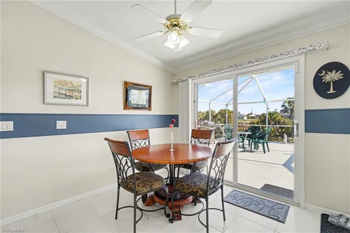 Spacious breakfast nook overlooking pool and canal