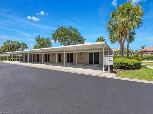 View of front of home with covered parking