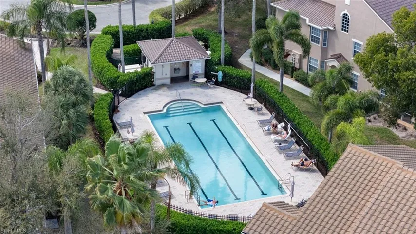 Community pool featuring a patio