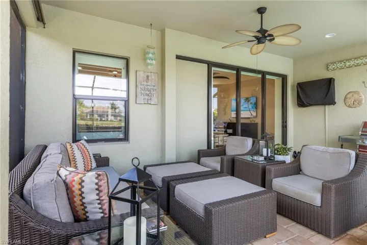 View of patio / terrace featuring an outdoor living space and ceiling fan
