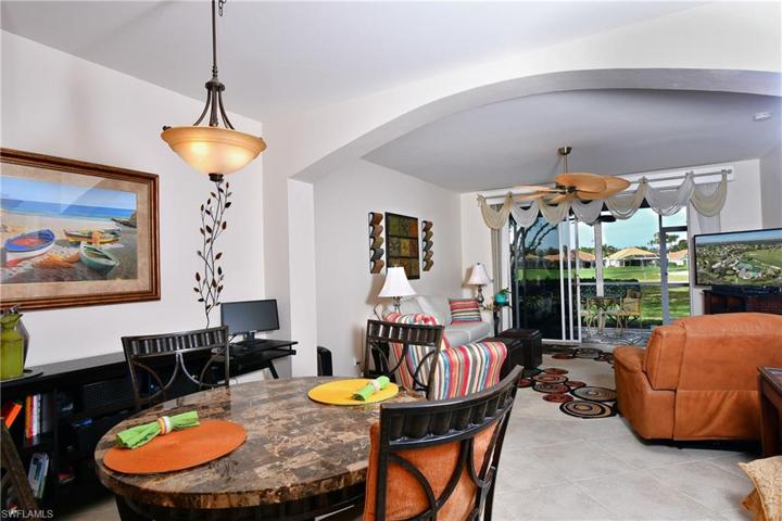 Bright living area with screened lanai with electric storm shutters