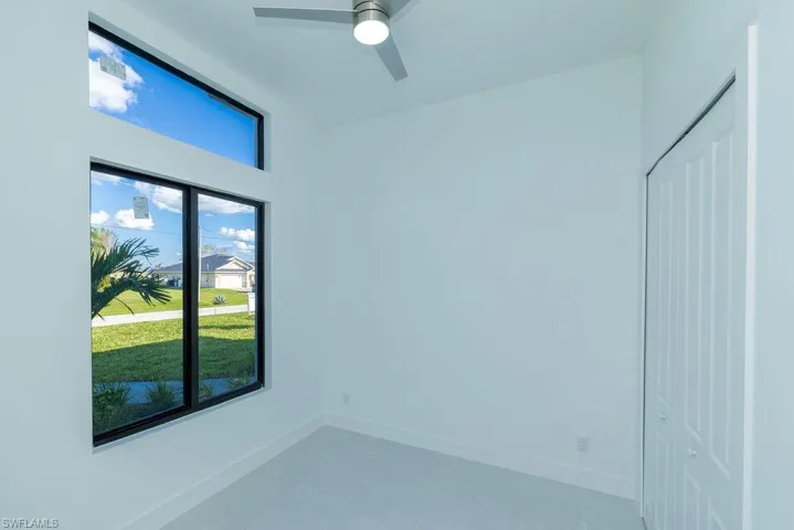 Unfurnished room with ceiling fan