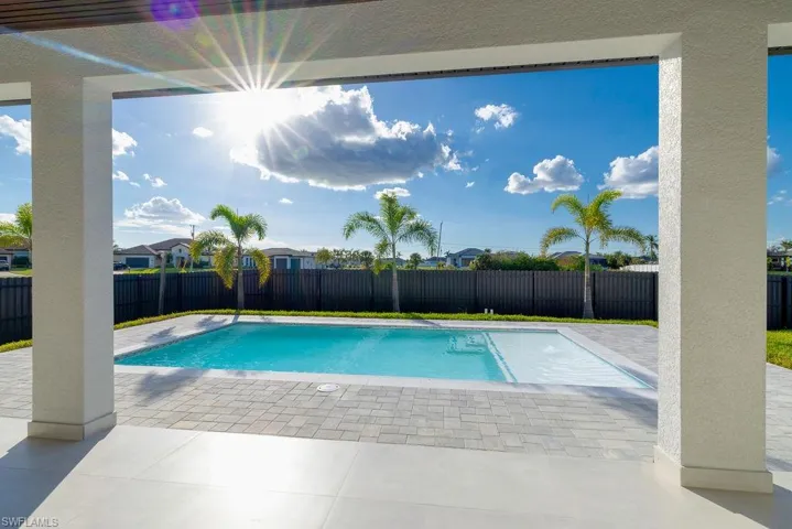 View of pool with a patio area
