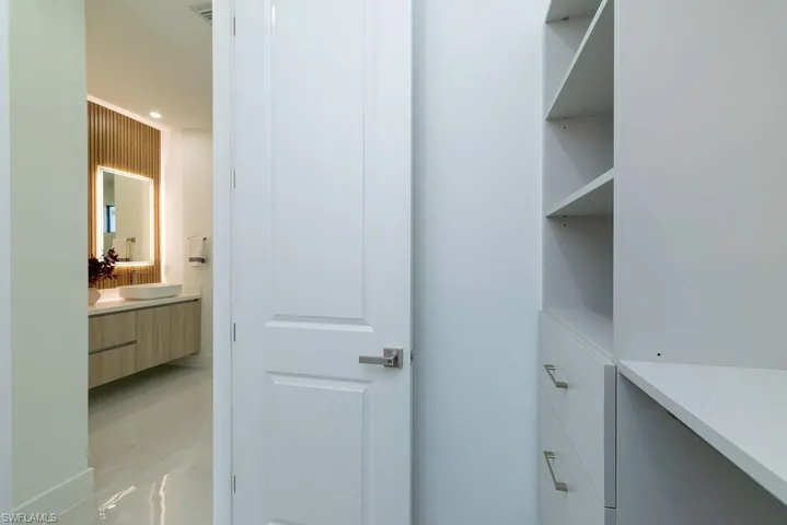 Spacious closet with sink