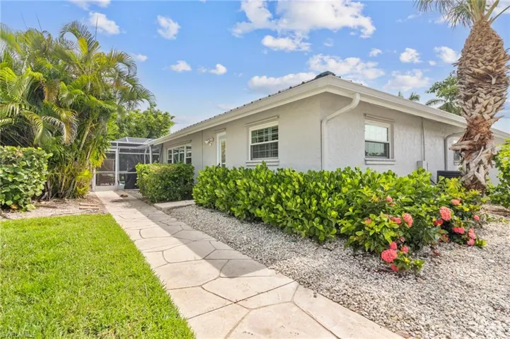 View of home's exterior featuring a lanai