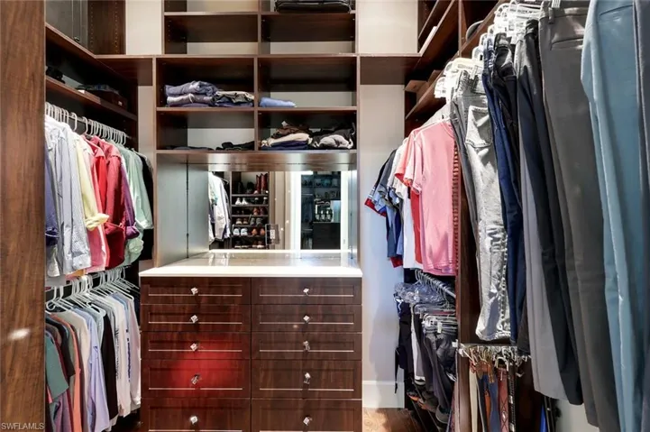 Second walk-in closet with automatic lighting.