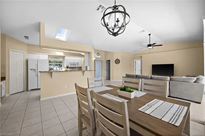 Dining Room and Breakfast Bar in Kitchen