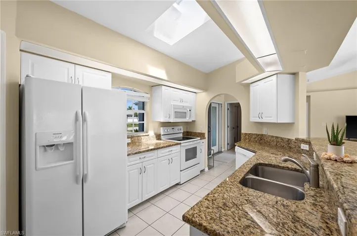 Kitchen with Dishwasher and Deep Stainless Sink