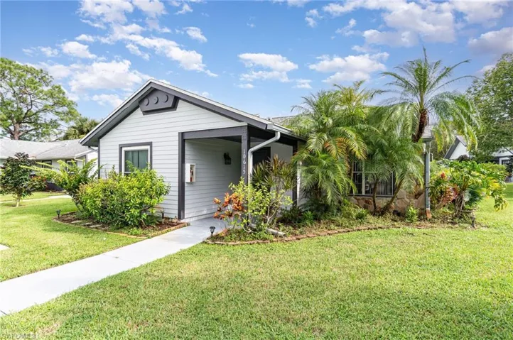 Bungalow-style home featuring a front lawn