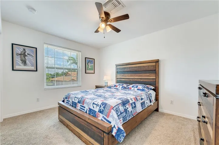 Carpeted guest bedroom