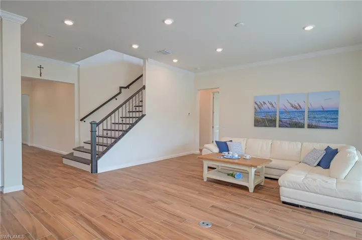 Living area - hardwood stairs