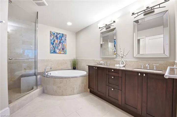 Primary Bathroom with a separate soaking Tub and spacious shower