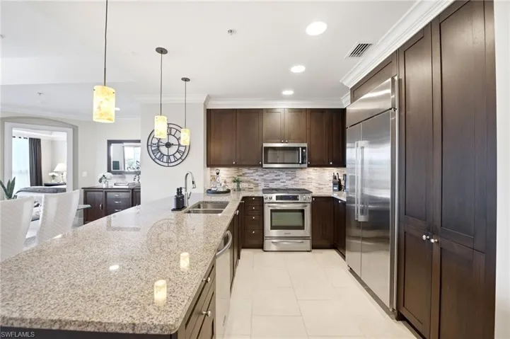 Gorgeous Dark cabinets with a new Refrigerator