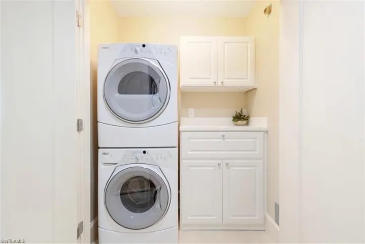Laundry Area with Built-In Cabinetry for Storage
