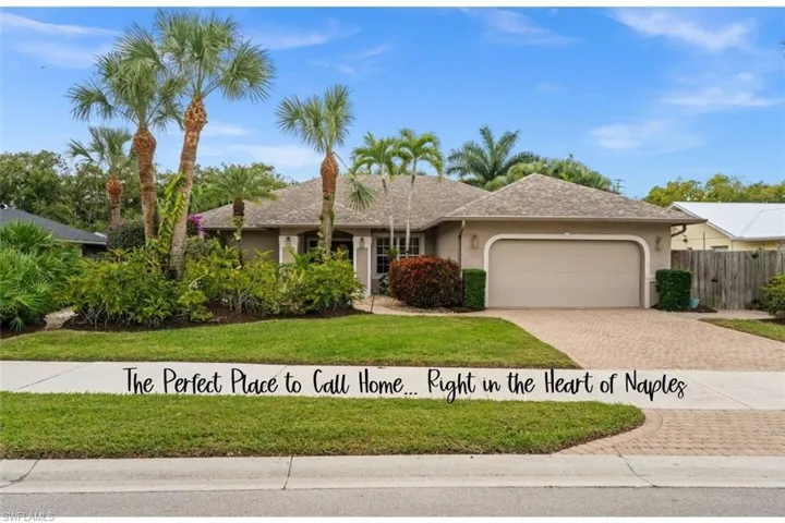 Single story home with stucco siding, decorative driveway, and a garage