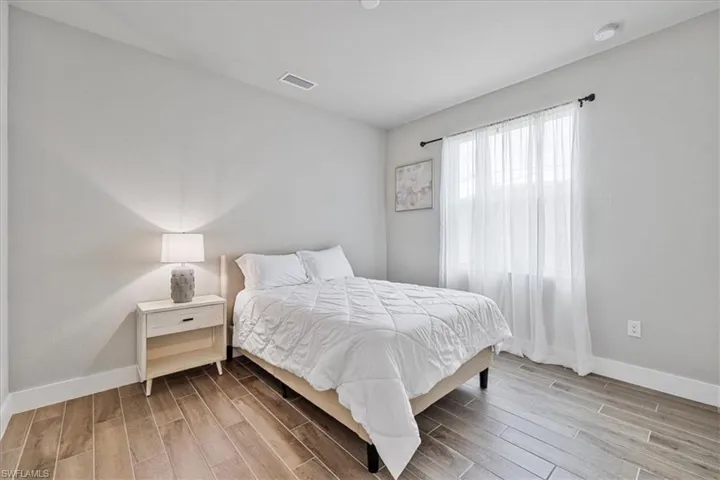 Bedroom featuring wood finished floors