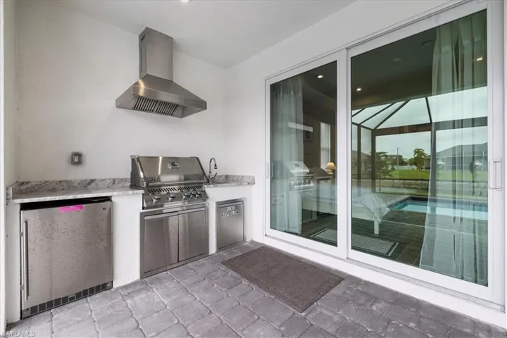 View of patio with area for grilling