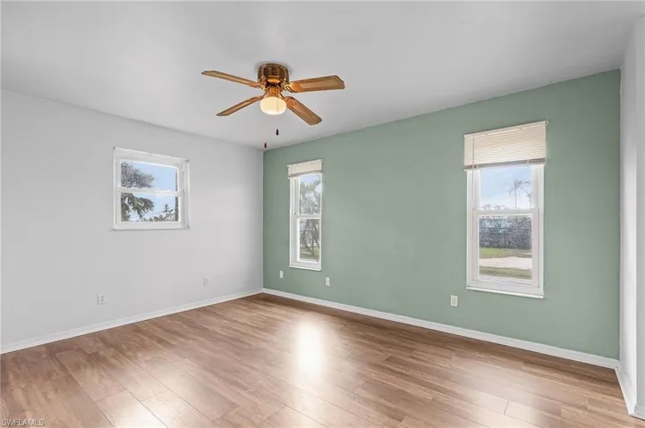 Master bedroom has lots of natural light.