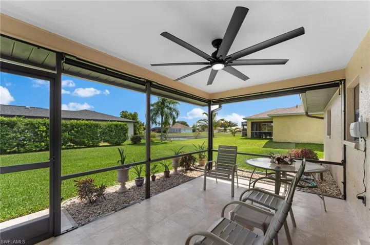 Screened Lanai with ceiling fan and tile floor