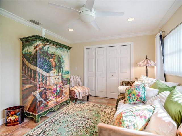 Bedroom #3 with a pull-out sofa  and beautifully, hand-painted armoire.
