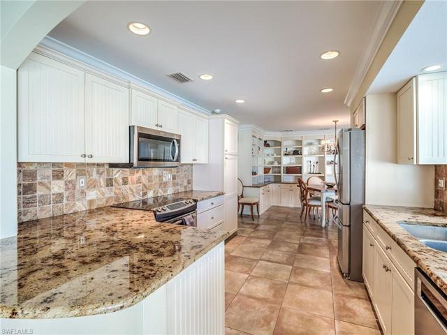 Kitchen with custom cabinets and granite countertops