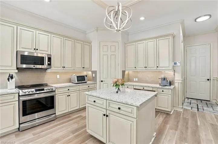 SS Appliances- LG Stove & Microwave, Bosch Dishwasher, and Thin Q 4 Drawer French Fridge. Also Features seated desk area with drawers. Nice Walk-in Pantry too.
