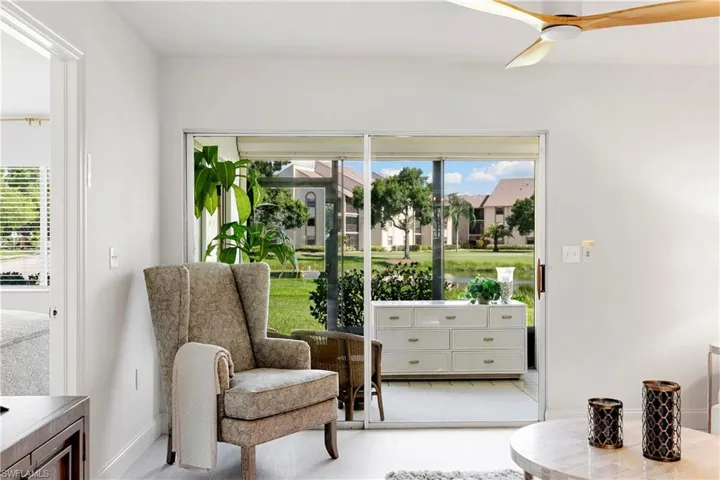 Living area featuring ceiling fan
