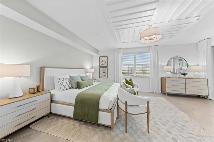Bedroom with light tile patterned floors