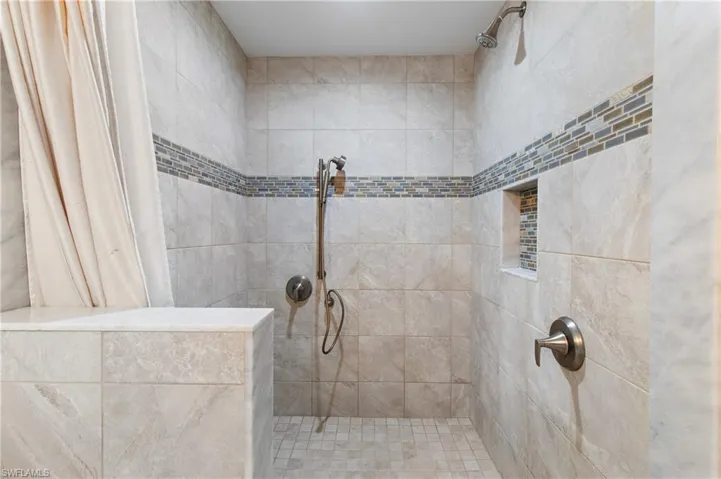 Bathroom featuring walk in shower