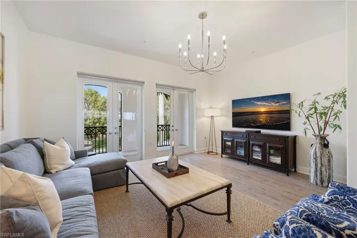 French doors to the covered balcony