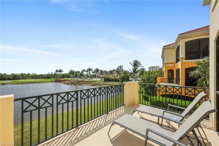 Open sun deck overlooking the lake and 18th fairway and green.
