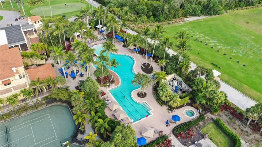 Club pool, fire pit area, tiki bar and gathering area