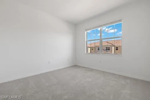 Empty room featuring carpet
