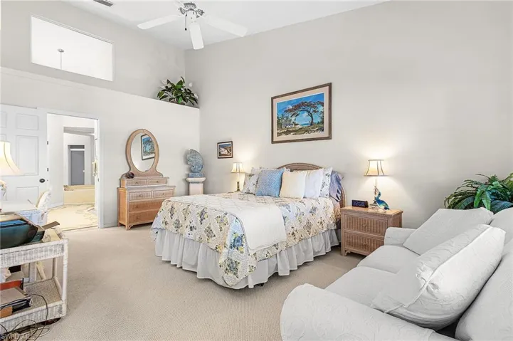 Primary bath has a large soaking tub and separate walk-in, tiled shower.