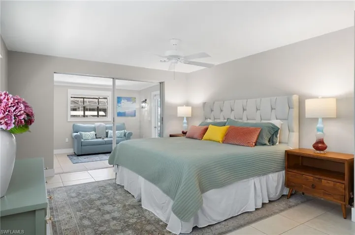 Tiled bedroom with ceiling fan