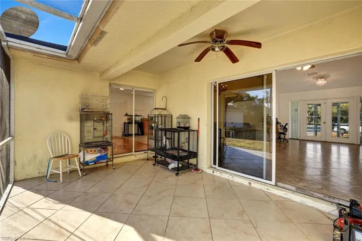 View of patio / terrace with ceiling fan and french doors