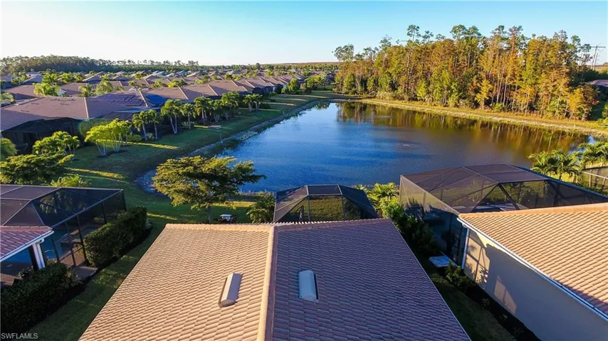 Aerial view of residential area with a nearby body of water