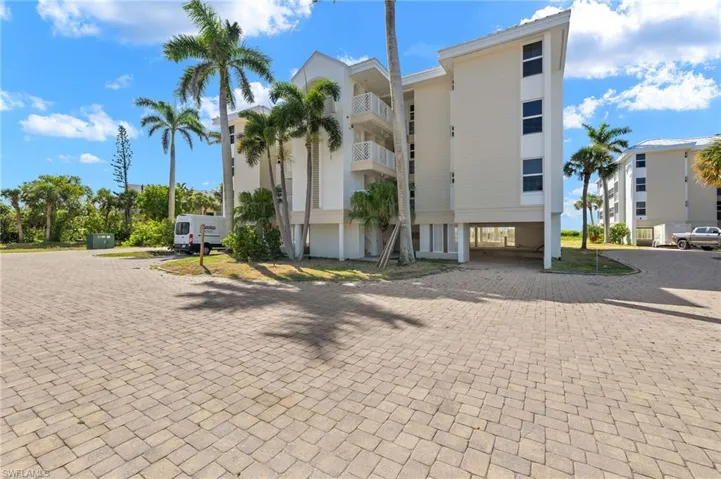 View of property featuring a carport