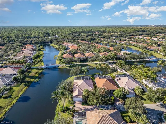 Aerial view of residential area with a nearby body of water