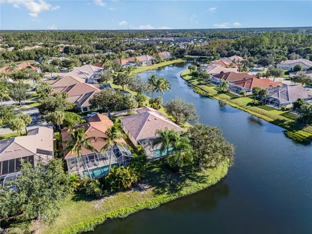 Aerial view of residential area with a large body of water