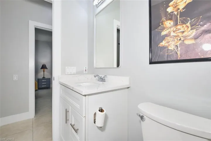 Bathroom featuring vanity and light tile patterned flooring