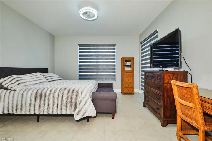 Bedroom featuring light tile patterned floors
