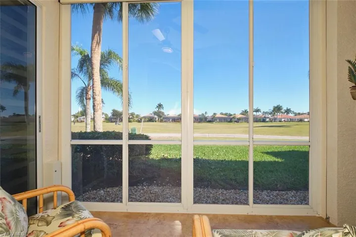 Sunroom with a residential view