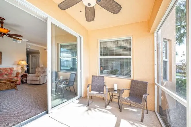 Sunroom with ceiling fan and plenty of natural light