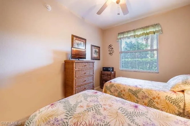 Bedroom featuring ceiling fan